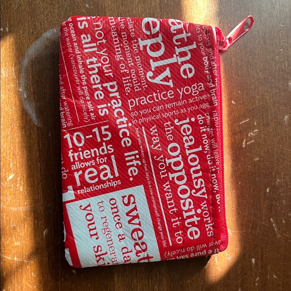 Red Zippered Pouch with Text Design